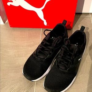 Puma’s black sneakers size 11 in excellent condition only worn several times.